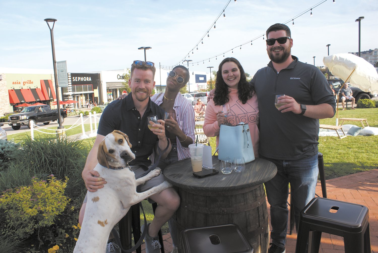 FRIENDS GATHER: Enjoying their evening during Garden City Sips were Walter, a 1 year old English Pointer, his parents Nick and Mika Loens and their friends Meaghan Dubois and Justin Moran. (Photo by Steve Popiel)